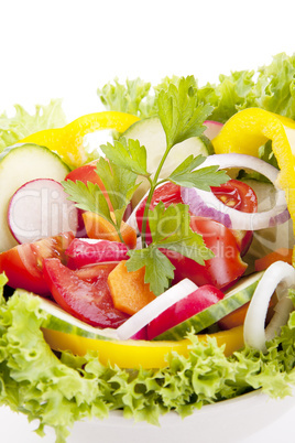 fresh tasty mixed salad with different vegetables isolated