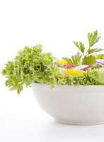 fresh tasty mixed salad with different vegetables isolated