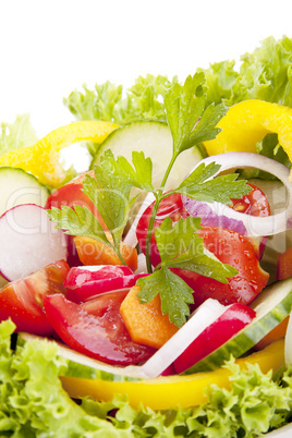 fresh tasty mixed salad with different vegetables isolated