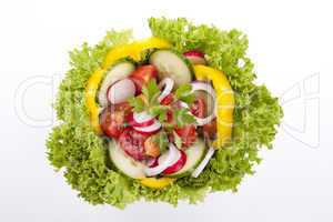 fresh tasty mixed salad with different vegetables isolated