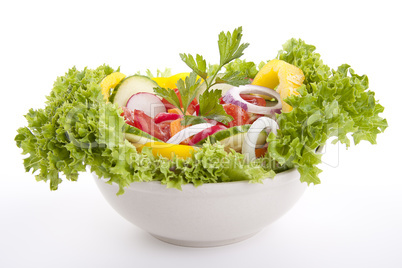 fresh tasty mixed salad with different vegetables isolated