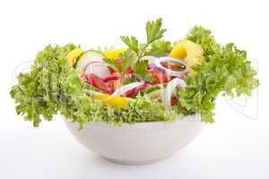 fresh tasty mixed salad with different vegetables isolated