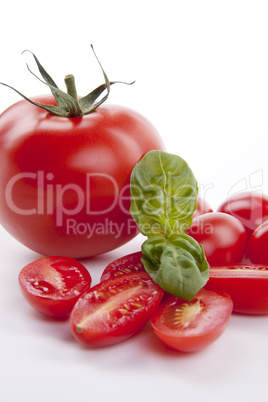 fresh red tomatoes with balsamic and oilve oil isolated