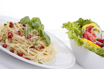 fresh pasta with chilli and basil isolated