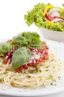 tatsty fresh spaghetti with tomato sauce and parmesan isolated