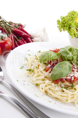 tatsty fresh spaghetti with tomato sauce and parmesan isolated