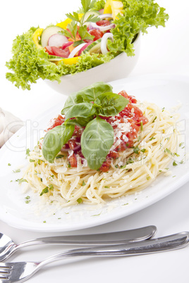 tatsty fresh spaghetti with tomato sauce and parmesan isolated