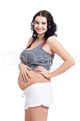 Happy beautiful young pregnant woman
