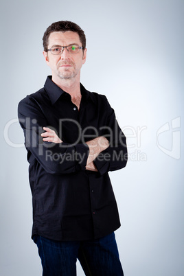 attractive adult man with glasses and black shirt