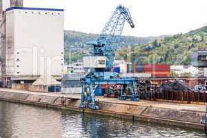 Shipyard with containers and cranes