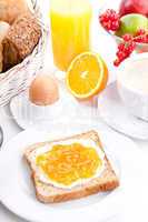 breakfast table with toast and orange marmelade isolated