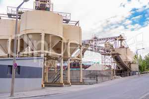 Metal tanks at a refinery plant or factory