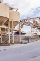 Metal tanks at a refinery plant or factory