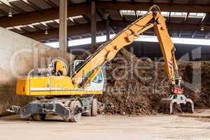 Heavy duty excavator doing earth moving