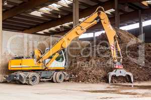 Heavy duty excavator doing earth moving