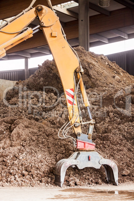 Heavy duty excavator doing earth moving