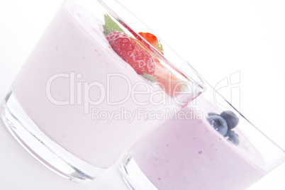 fresh tasty strawberry blueberry yoghurt shake cream isolated