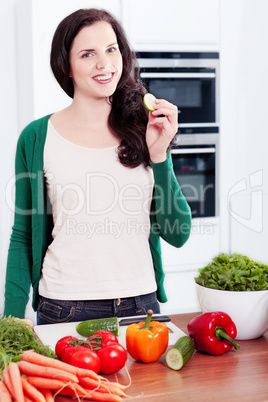 young woman cooking vegetarian food