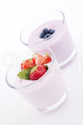 fresh tasty strawberry blueberry yoghurt shake cream isolated