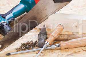 Drill with timber, screwdrivers and screws