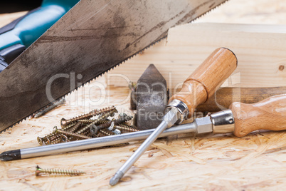 Drill with timber, screwdrivers and screws