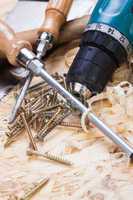 Drill with timber, screwdrivers and screws