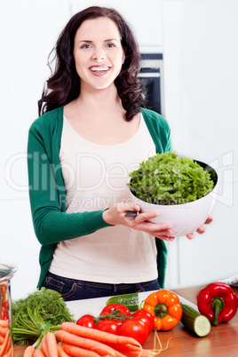 young woman cooking vegetarian food