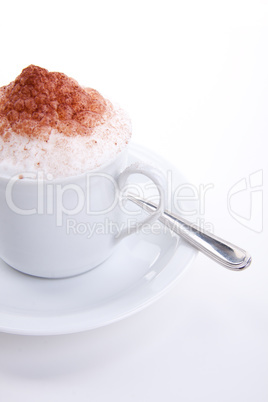 fresh capuccino with chocolate and milk foam isolated