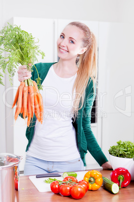 young woman cooking vegetarian food