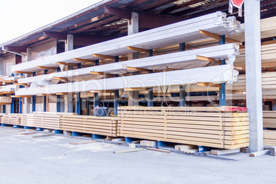 Wooden panels stored inside a warehouse