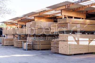 Wooden panels stored inside a warehouse