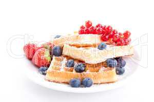 sweet fresh tasty waffles with mixed fruits isolated