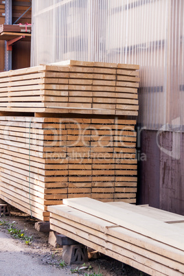 Wooden panels stored inside a warehouse