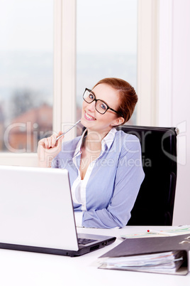 smiling successful young business woman