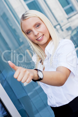 attractive young successful smiling business woman standing outdoor