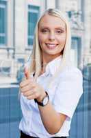 attractive young successful smiling business woman standing outdoor