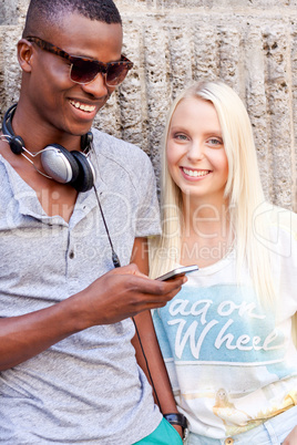 happy young couple have fun in the city summertime