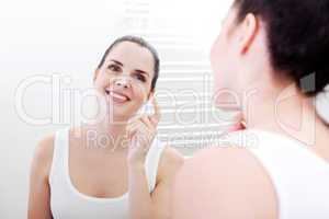 apllying cream on face skincare