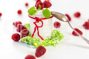 Raspberries and yoghurt or clotted cream
