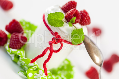 Raspberries and yoghurt or clotted cream