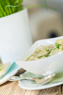 Dish of savory pork tortellini in broth pelmeni russian