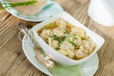 Dish of savory pork tortellini in broth pelmeni russian