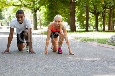 young couple runner jogger in park outdoor summer