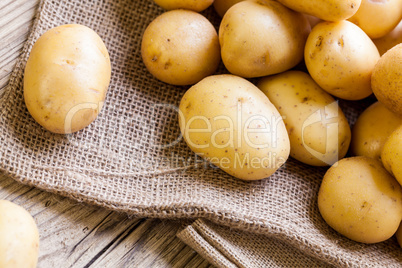 Farm fresh  potatoes on a hessian sack