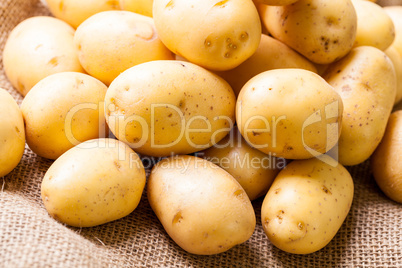 Farm fresh  potatoes on a hessian sack