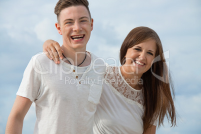 smiling young couple having fun in summer holiday