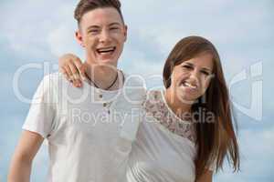 smiling young couple having fun in summer holiday