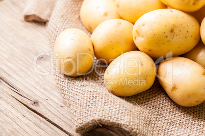 Farm fresh  potatoes on a hessian sack