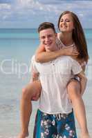 smiling young couple having fun in summer holiday