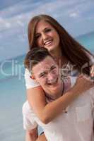 smiling young couple having fun in summer holiday